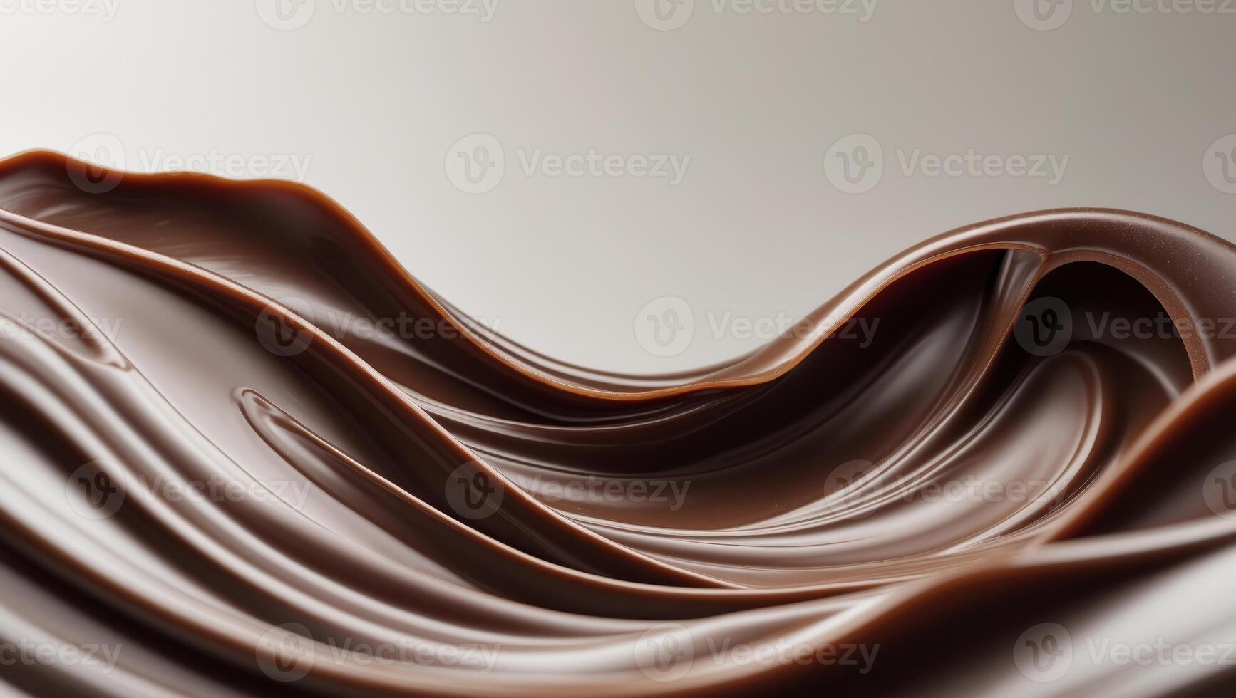 Smooth and Rich Melted Chocolate Flowing in Luxurious Waves Creating a Delightful Texture photo