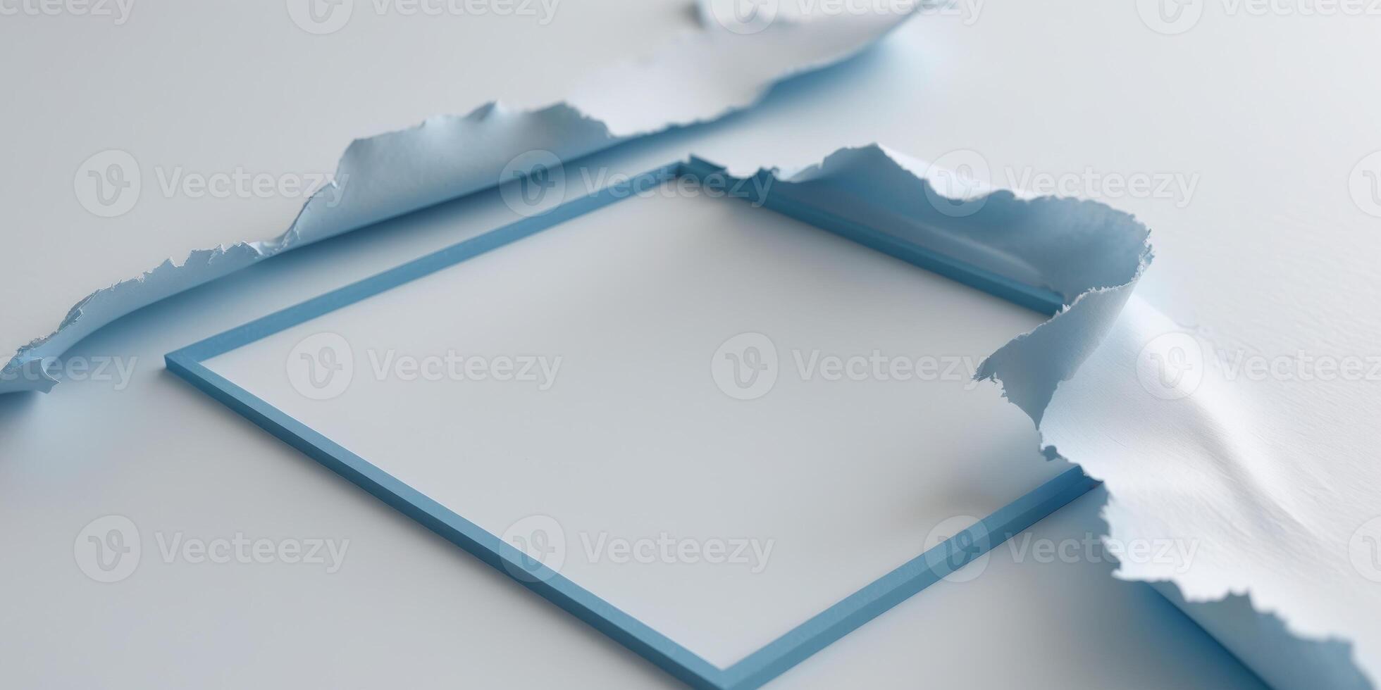 Torn Paper Sheet with Blue Border Displays a Blank Space photo