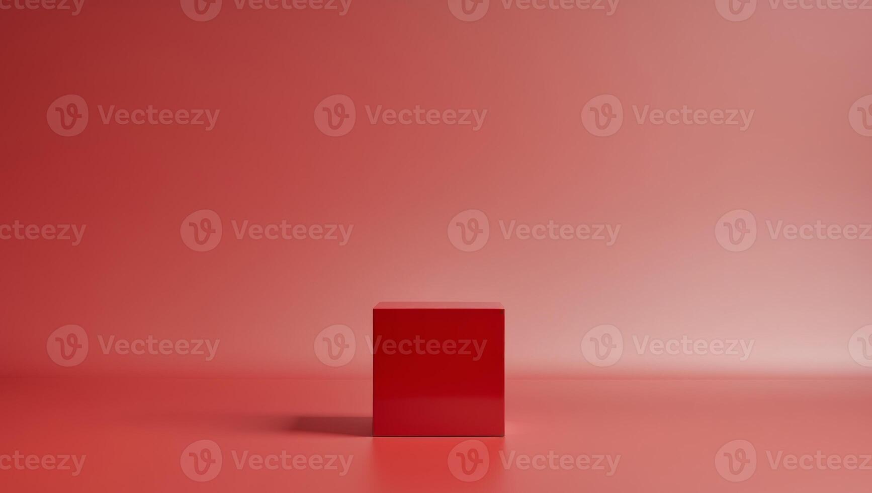 Red cube standing on red surface with red background. photo