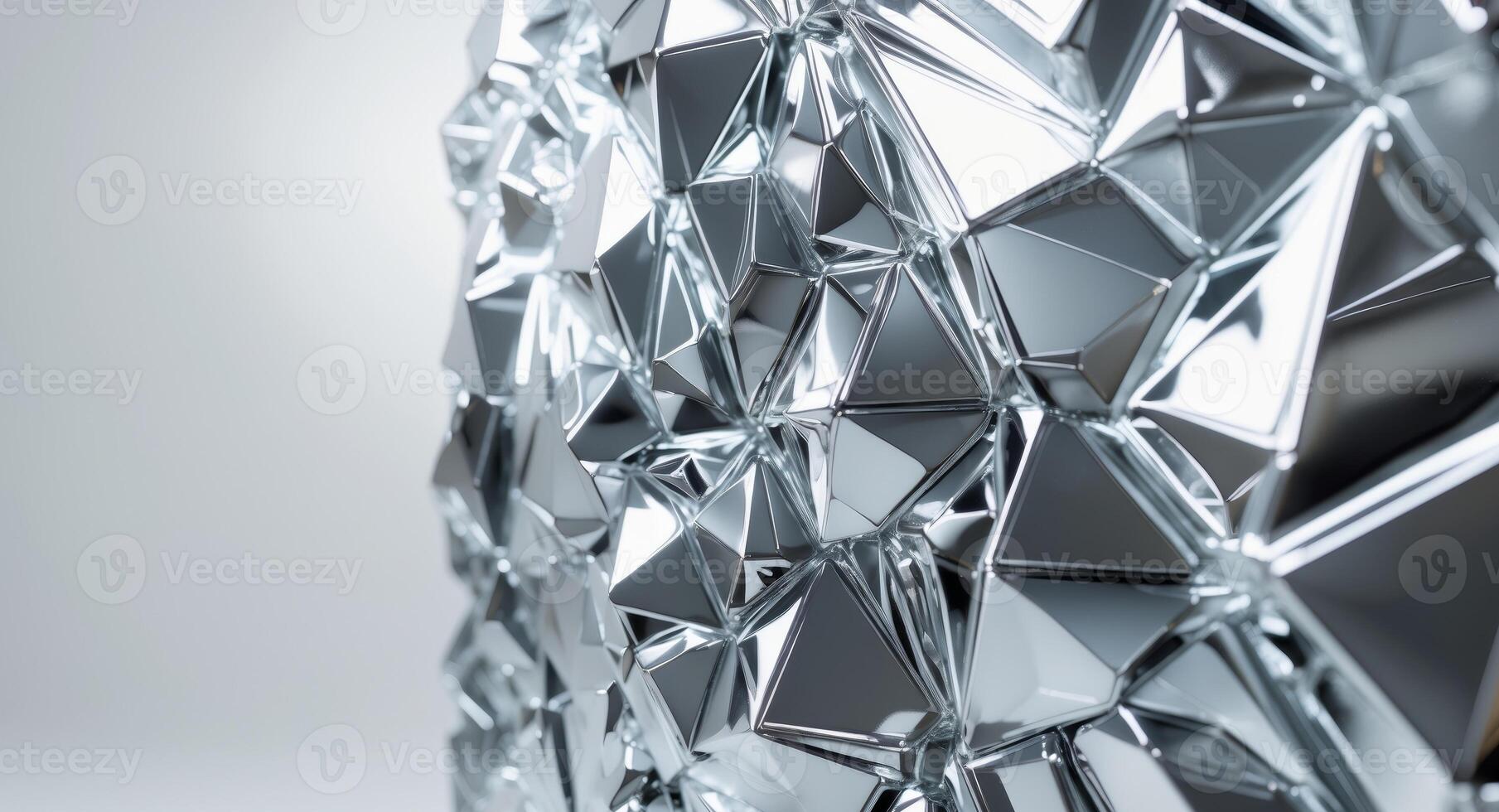Reflective metallic surface with intricate texture and sharp angles under bright lighting conditions photo