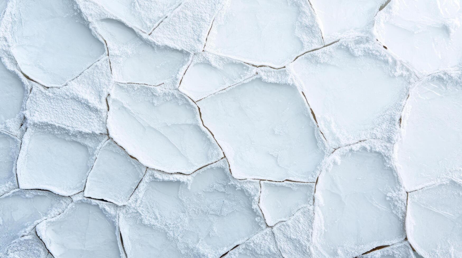 Intricate cracked ice texture with frosty appearance and unique patterns photo