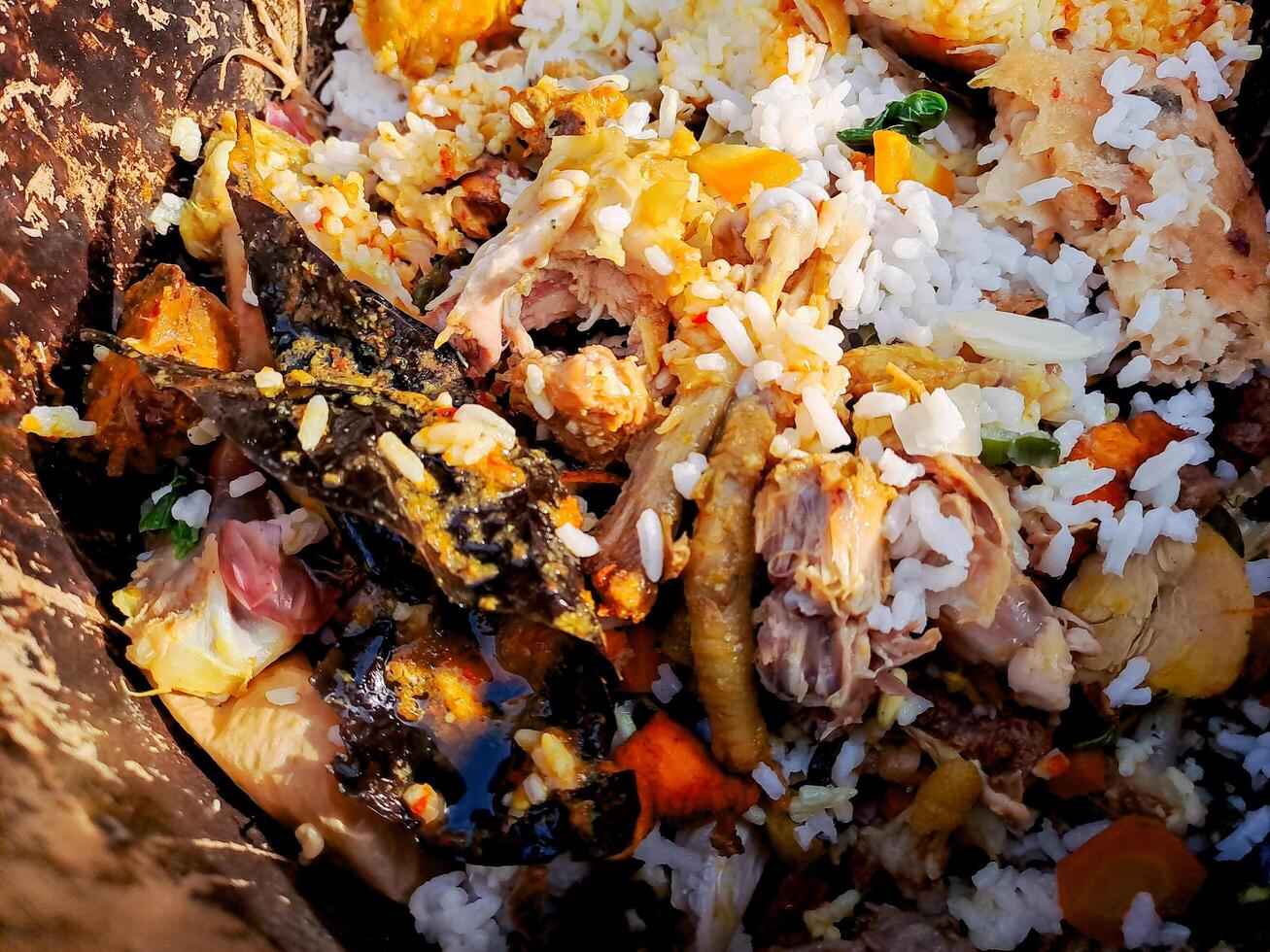 A pile of food that is in a brown container photo