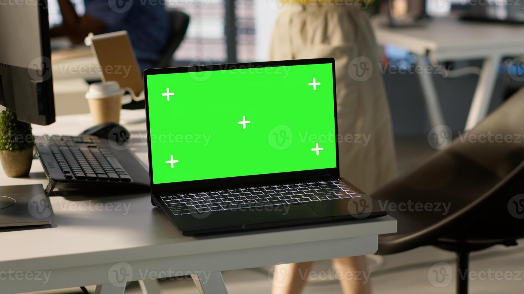 Focus on chroma key laptop in workspace used by computer scientists doing software debugging. Close up of isolated screen notebook used by workers in office fixing coding issues, camera A photo