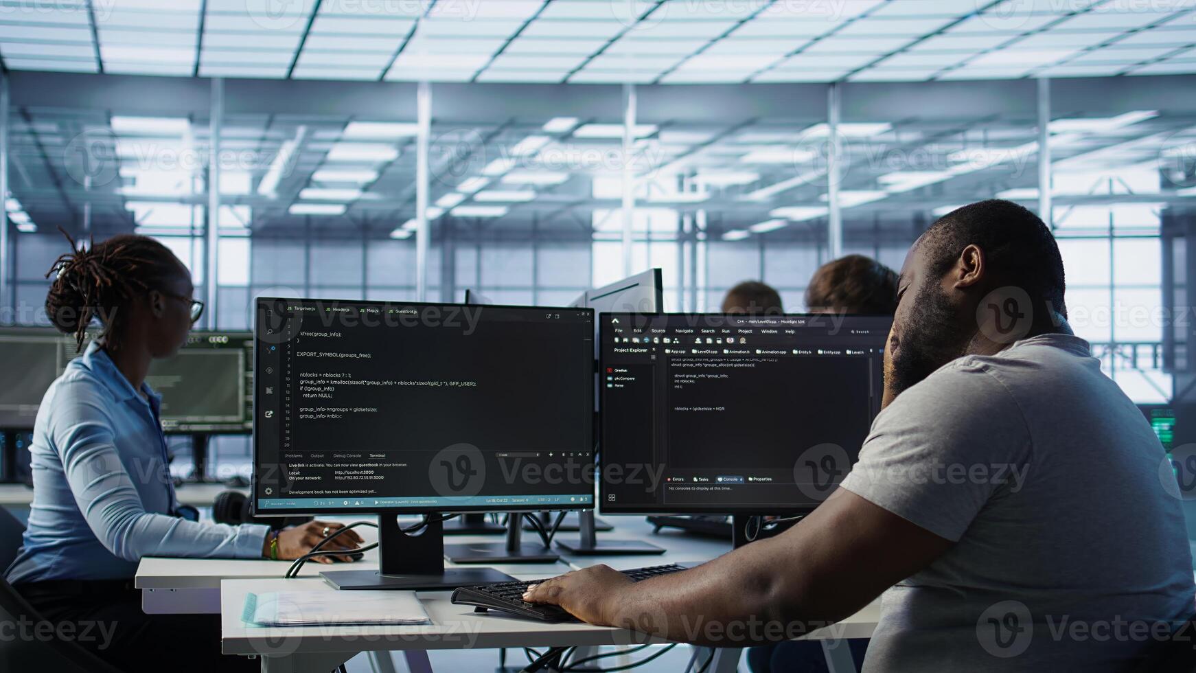 System admin feeling ill, having fever while working in computer network security data center. Sick worker suffering headache while monitoring energy consumption across server racks, camera B photo