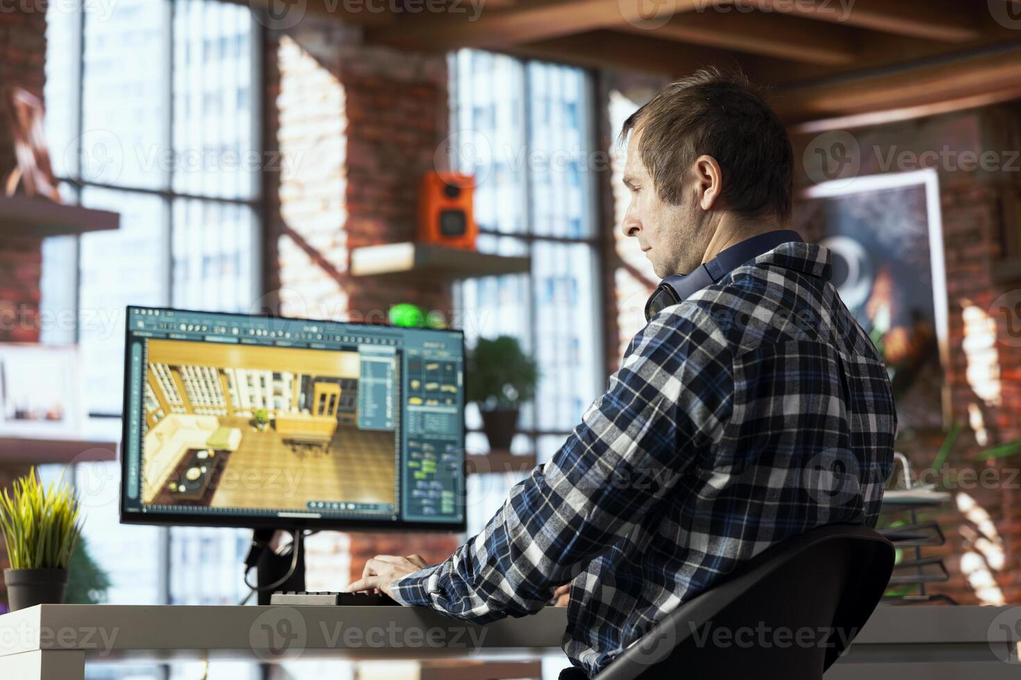 Interior designer using interior design app to redesign room, planning out new apartment. Architectural designer using virtual home decorating program to preview design implementations photo