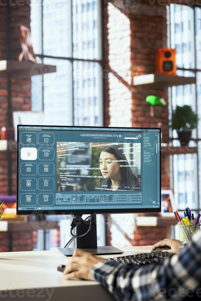 Worker designing UI for artificial intelligence GPT application turning text prompt into photos. IT employee in home office using neural network tech to build text to image models photo