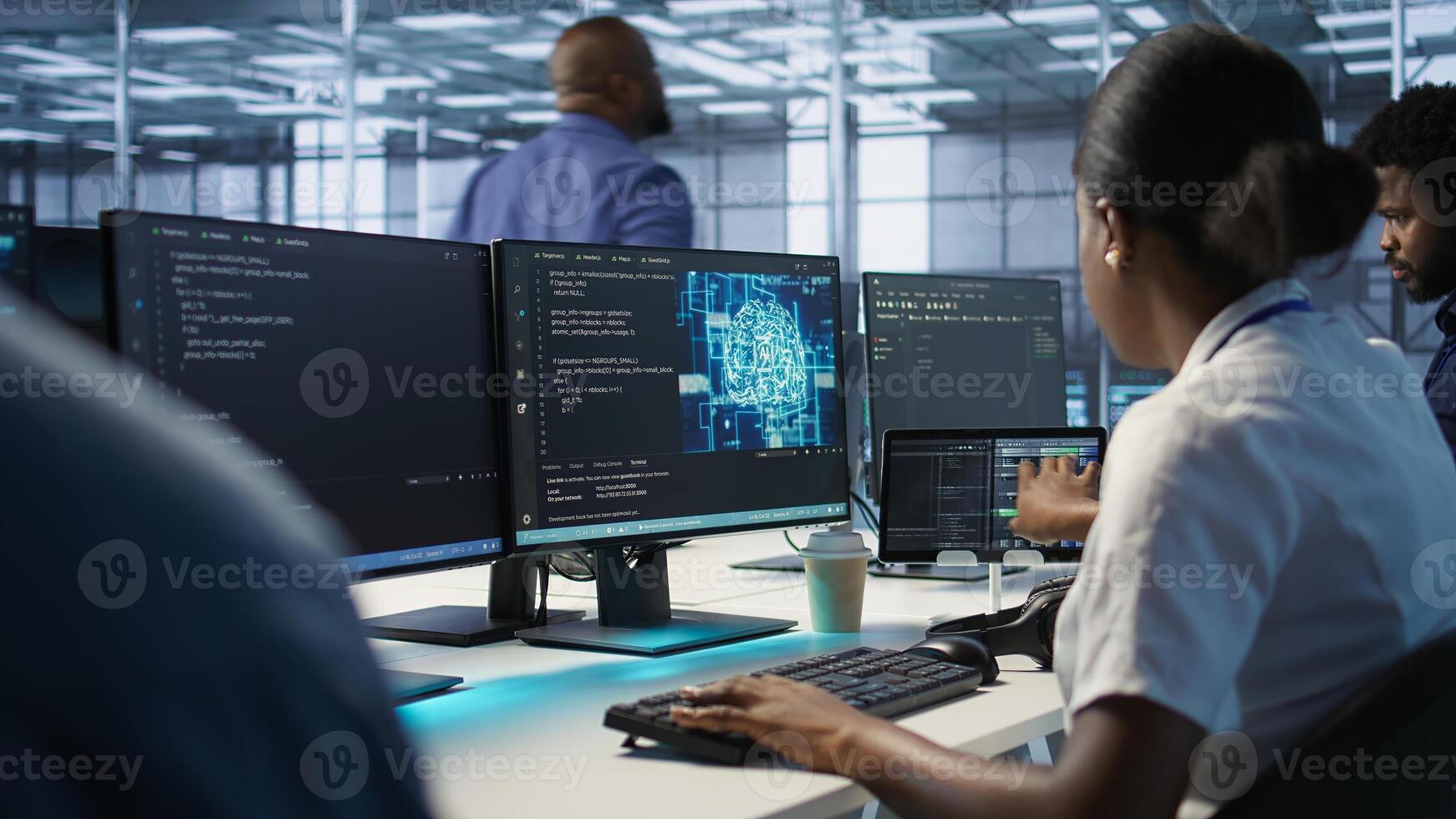 Engineer in data center implementing advanced AI driven predictive maintenance systems to proactively identify and resolve potential hardware failures before they impact operations, camera A photo