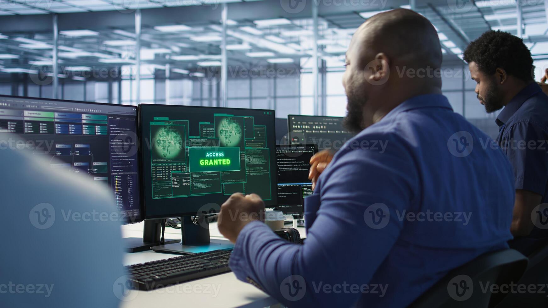 Data scientists receive access granted notification while reconfiguring server hub, optimizing it. Team of IT experts ensures data center operates efficiently, successfully eliminating all errors photo