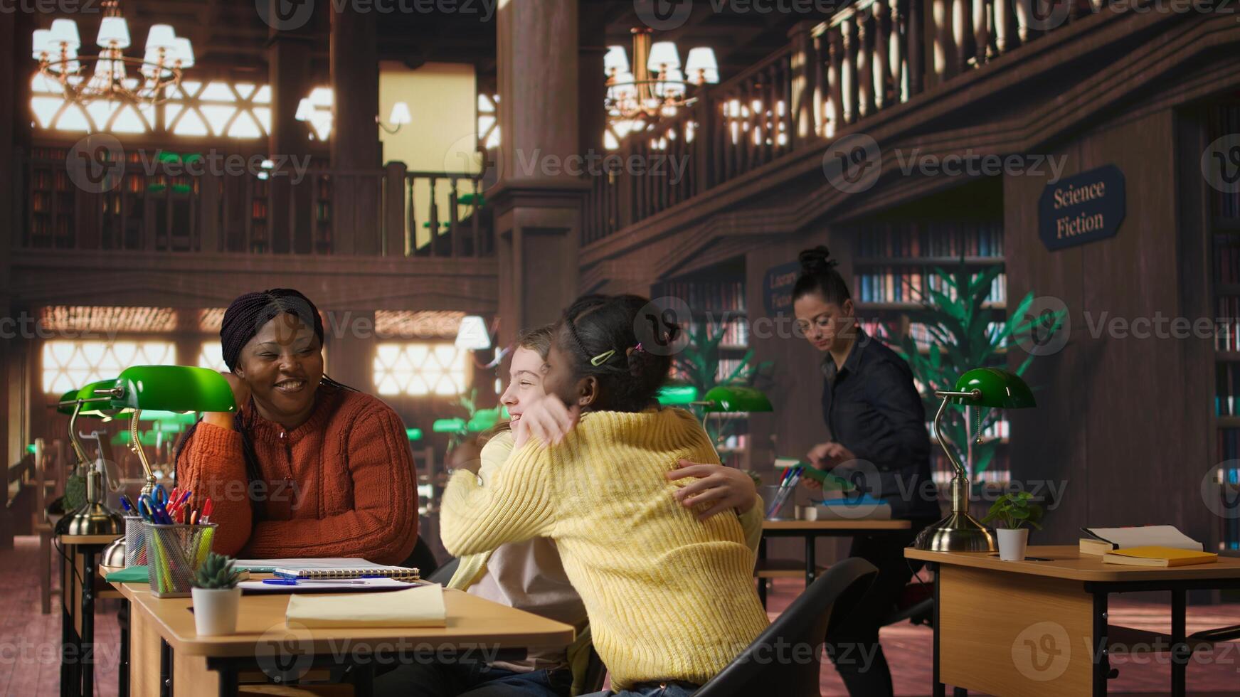 Cheerful diverse classmates sharing a high five during private lessons with tutor in the library, finishing team project. Elementary school pupils feeling satisfied with academic progress. Camera A. photo