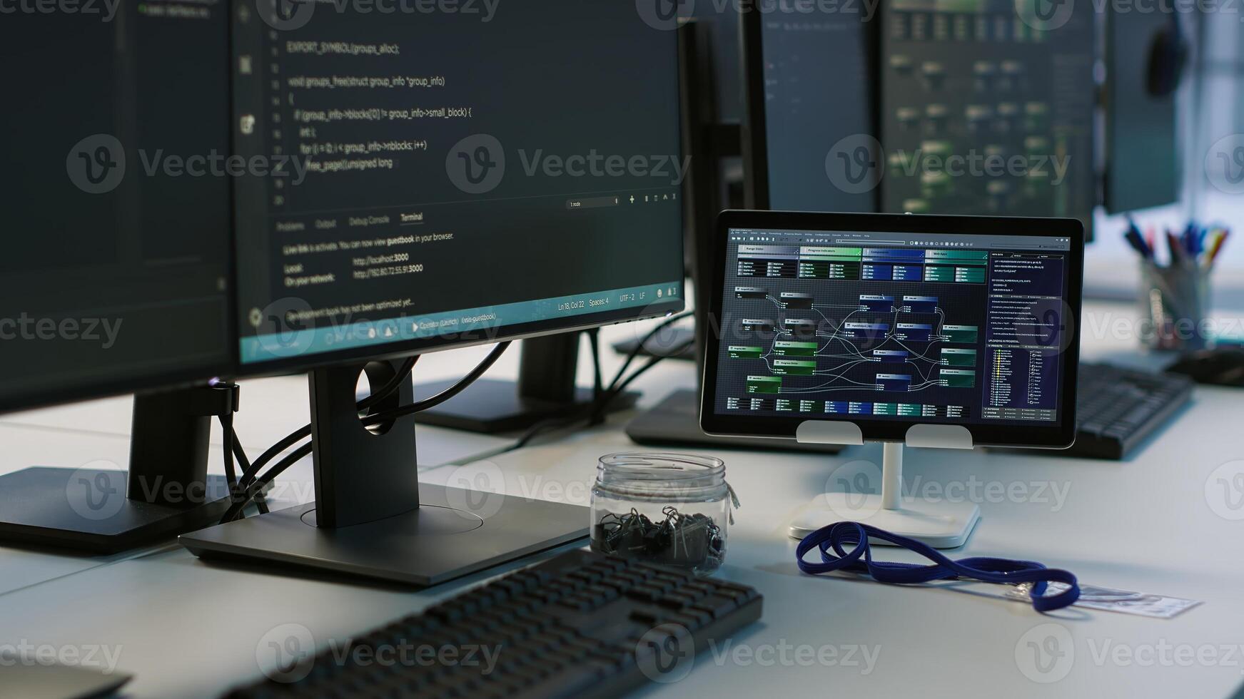 Computers and tablet in server room used for developing disaster recovery plans ensuring minimal downtime. Data center electronic equipment used for monitoring performance photo