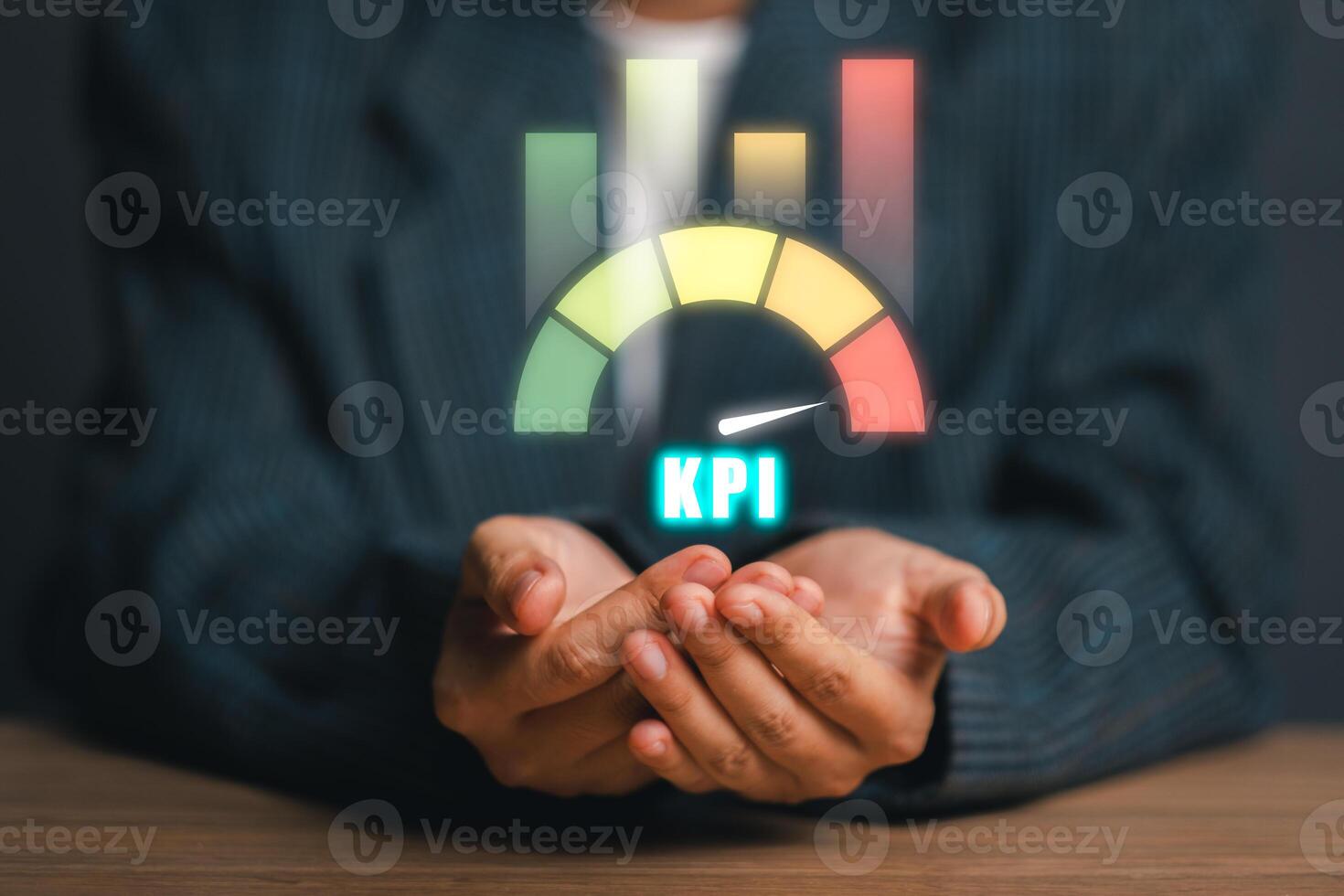 Hands holding a KPI icon with colorful bar graphs, symbolizing key performance indicators in business analytics and performance measurement. photo