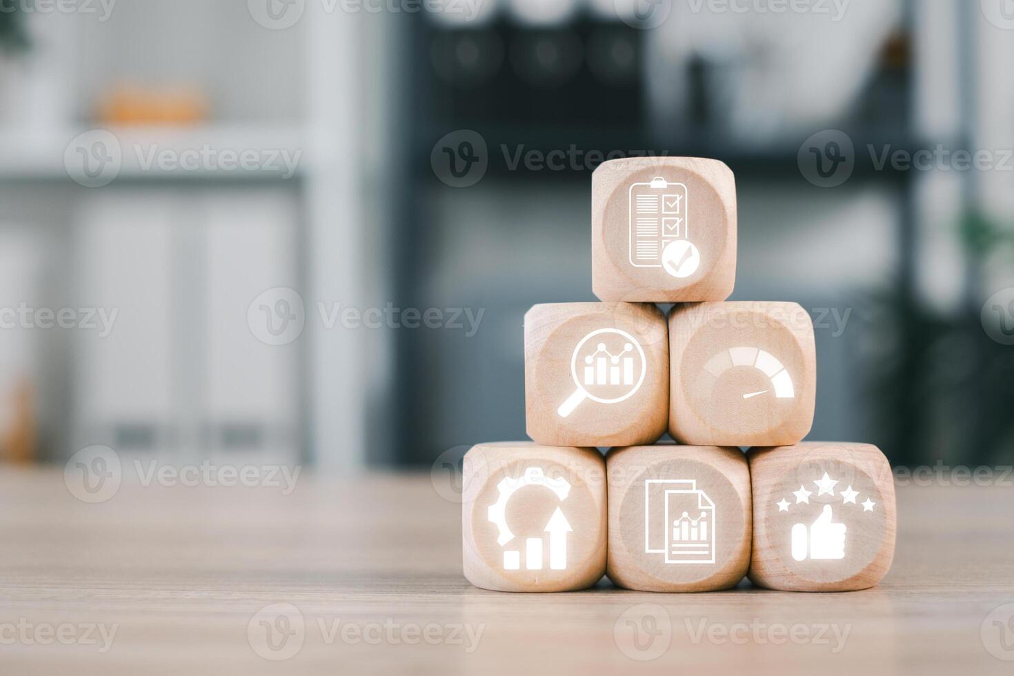 Wooden blocks with evaluation icons symbolizing business performance and strategy in a modern office environment. photo