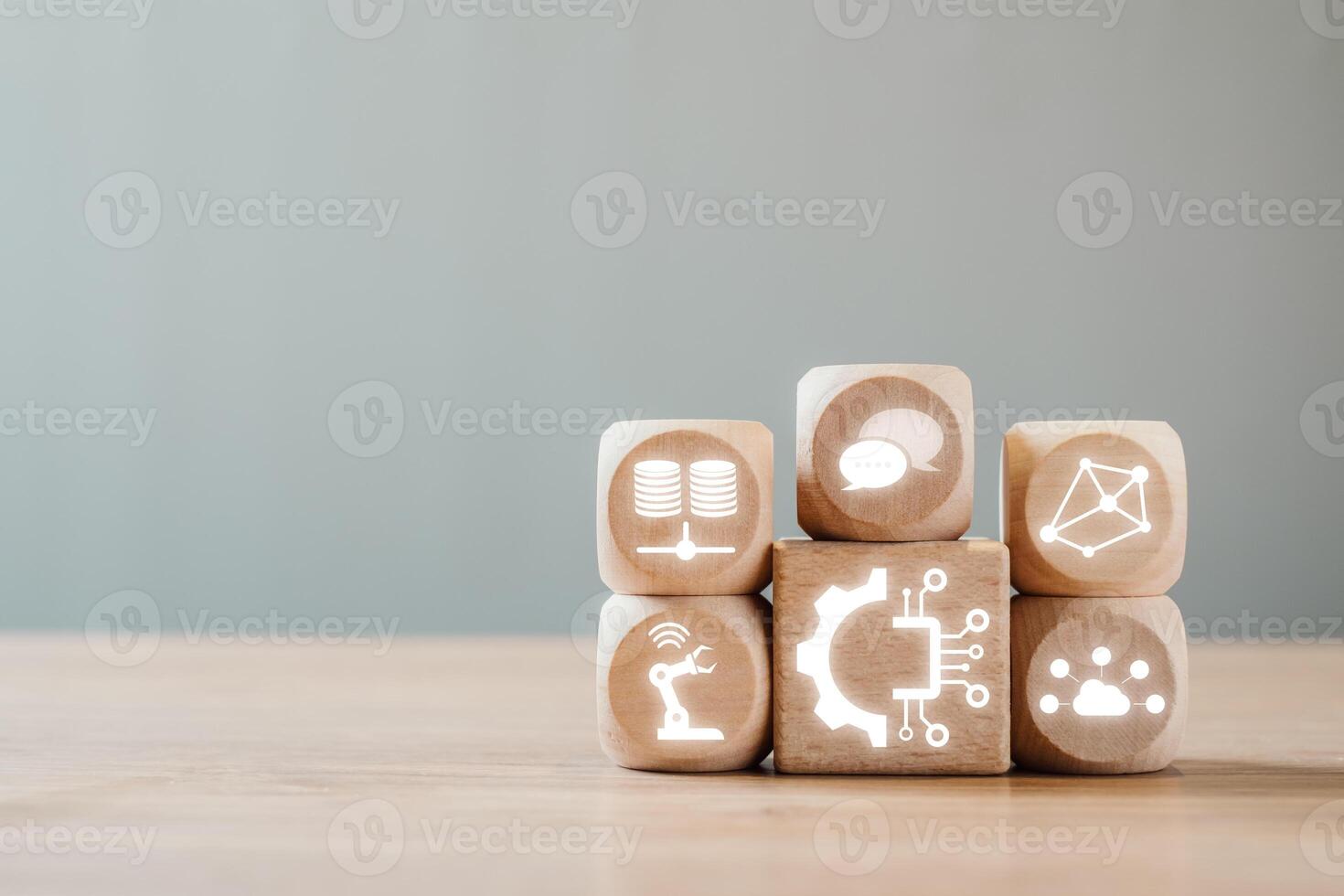 Wooden blocks with digital icons representing modern technology and innovation for business transformation. photo
