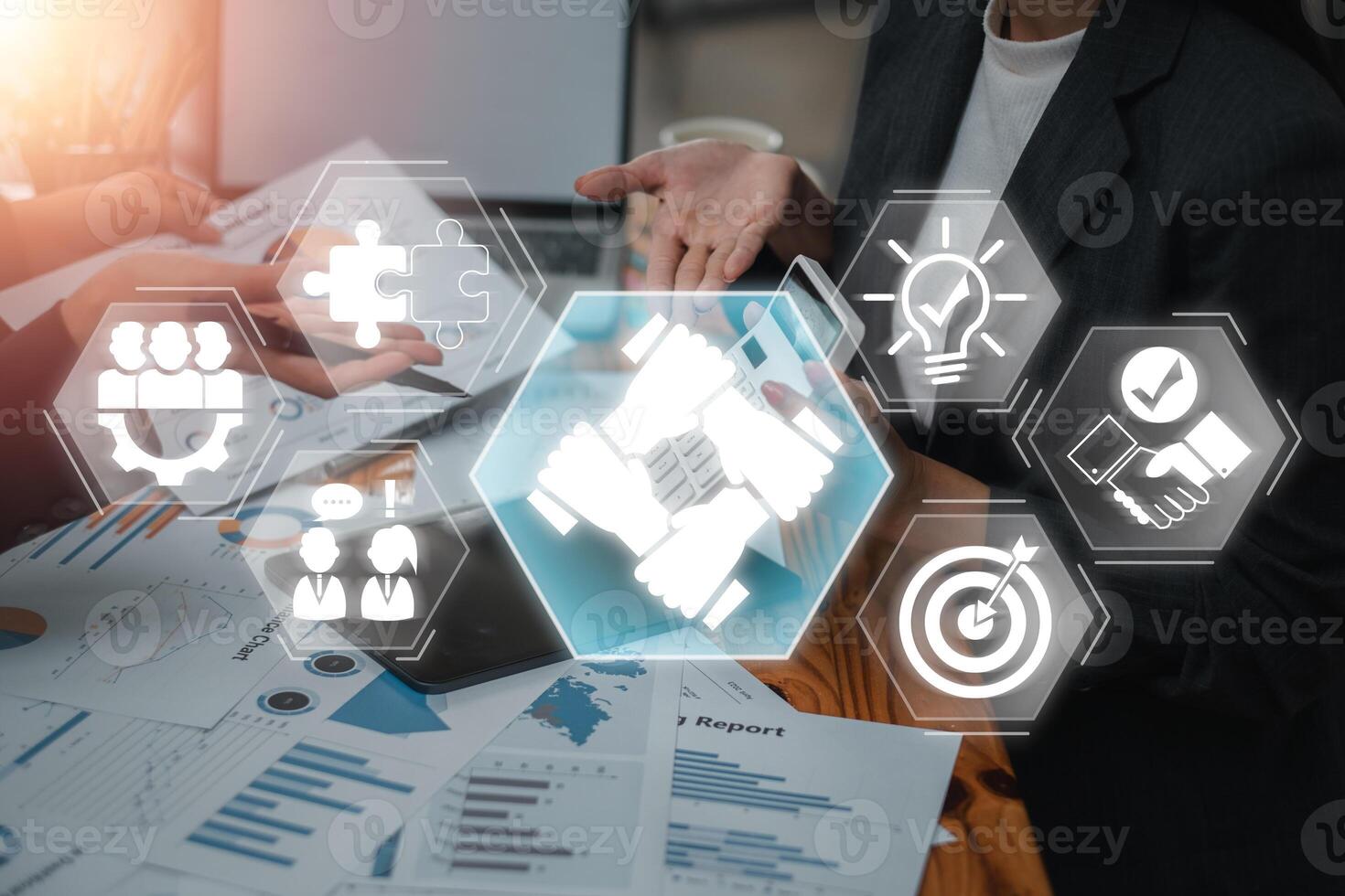 Visual representation of collaboration and innovation in a modern business setting, featuring teamwork and strategic planning. photo