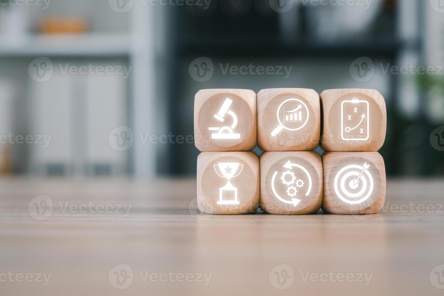Wooden blocks with icons symbolizing assessment, analysis, and strategy, perfect for business and educational themes. photo