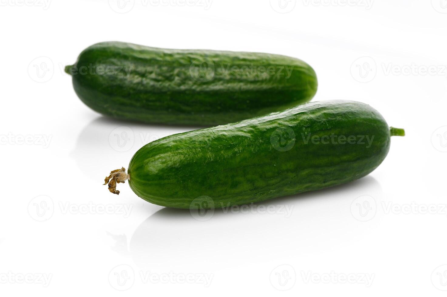 Freshly harvested cucumbers from the local farm ready for a delicious summer salad photo