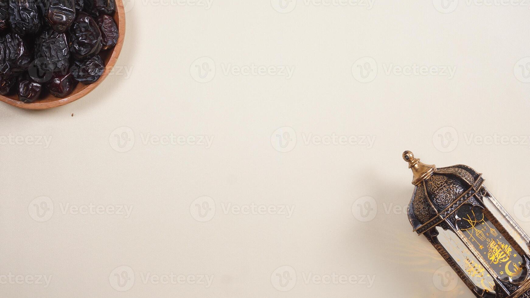 A Plate of Dates and A Lantern for Ramadan and Eid al-Fitr Greeting Concept photo