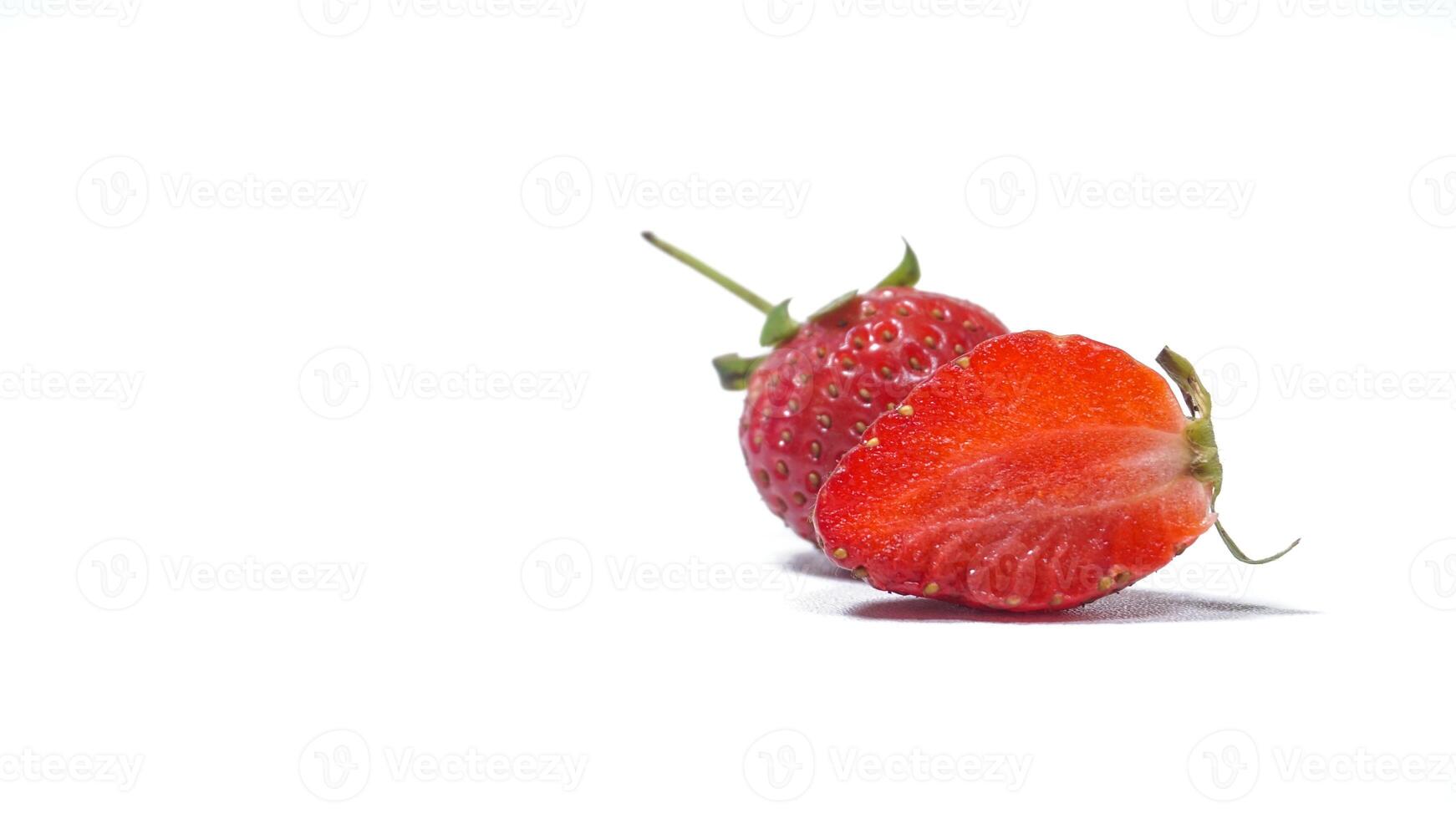 Strawberry with Half Sliced on White Background photo