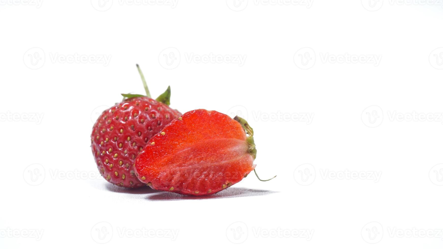 Strawberry with Half Sliced Isolated on White Background photo