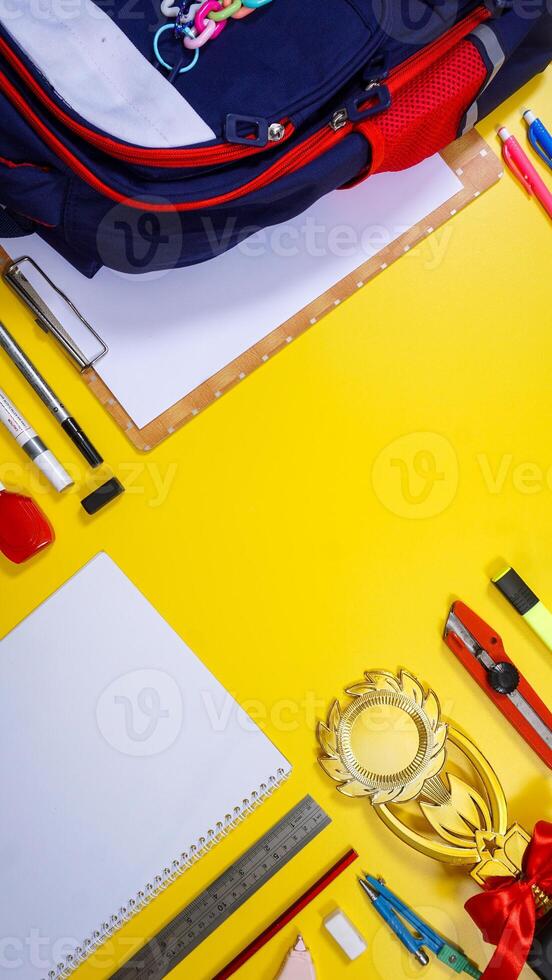 Back to School Concept with Copy Space Area Isolated on Yellow Background photo