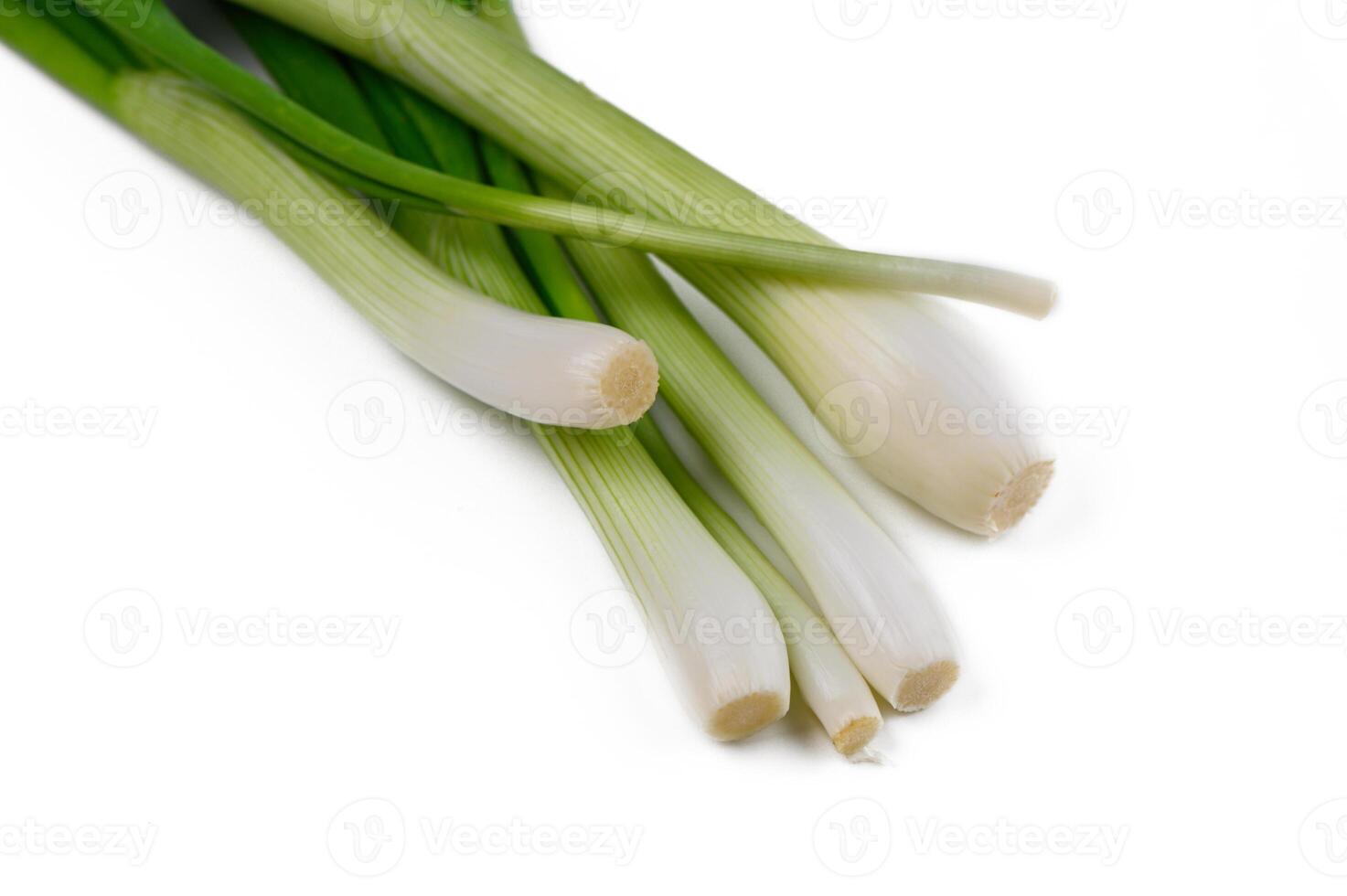 Fresh green onions ready for culinary creativity in a bright kitchen setting today photo