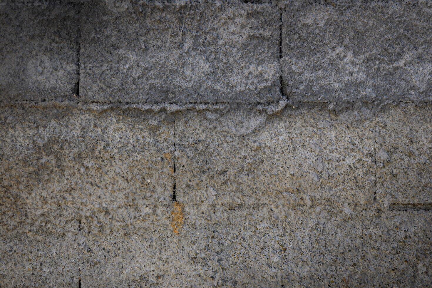 Textured concrete wall showcasing the raw beauty of industrial architecture in urban settings photo