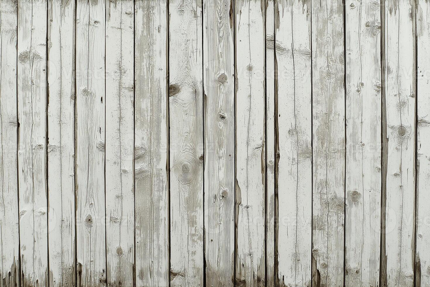 Weathered wooden planks painted white create a rustic charm in a serene, sunlit setting. photo