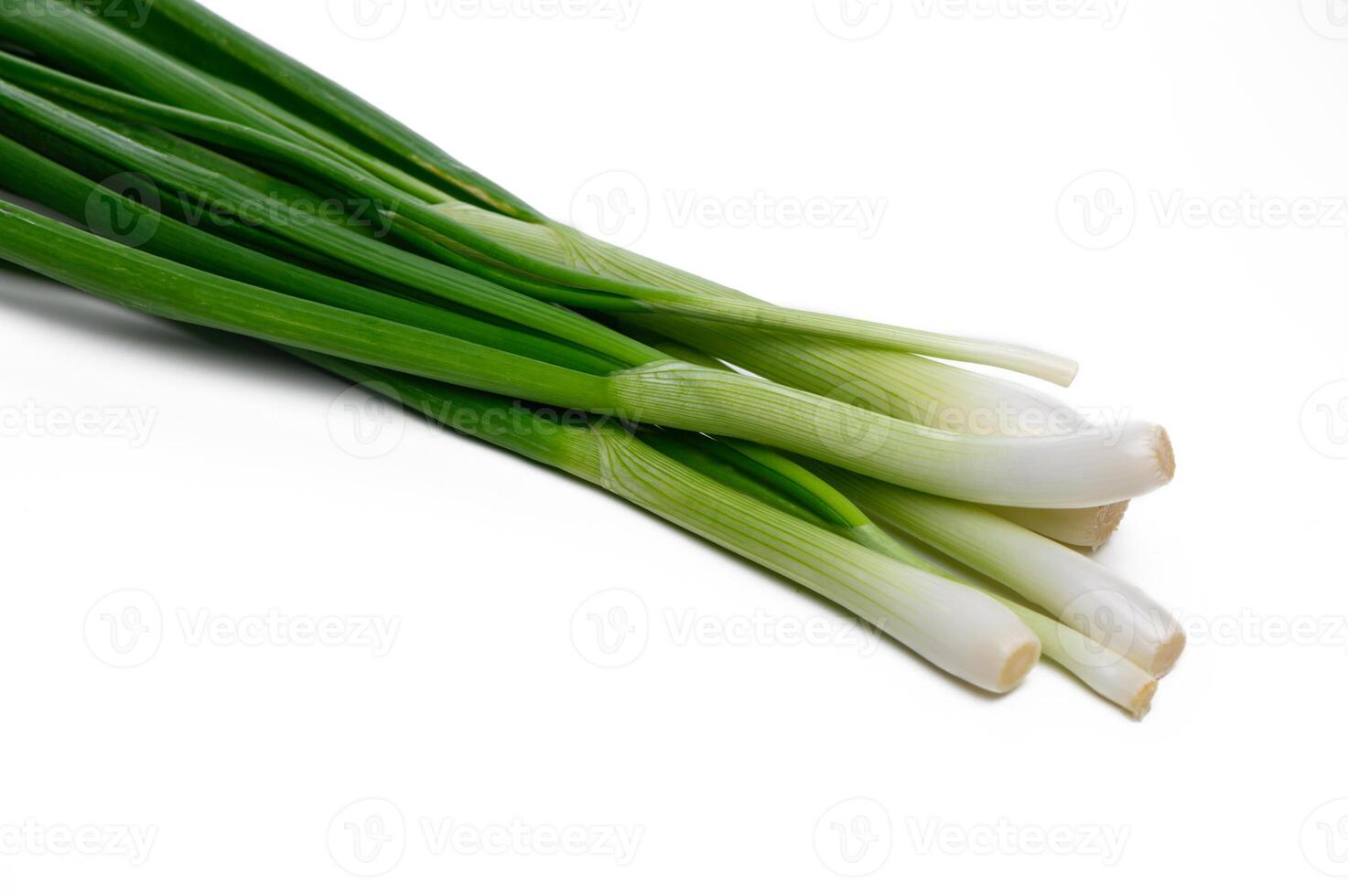 Fresh green onions ready for culinary use in a bright kitchen setting photo