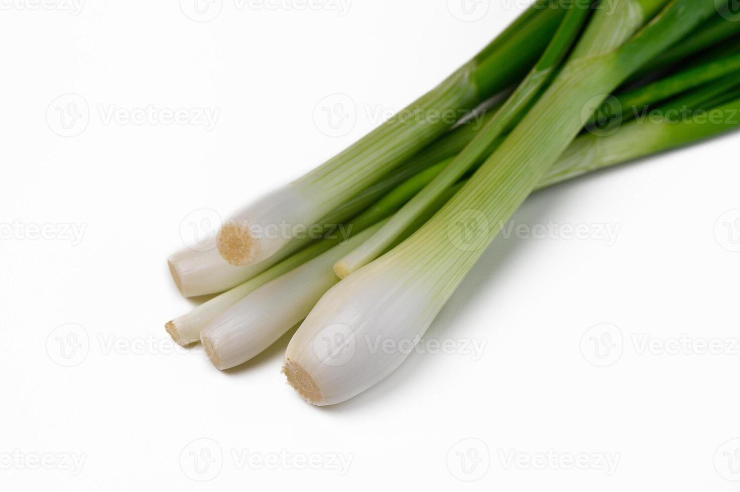 Fresh green onions ready for culinary adventures in a vibrant kitchen setting photo
