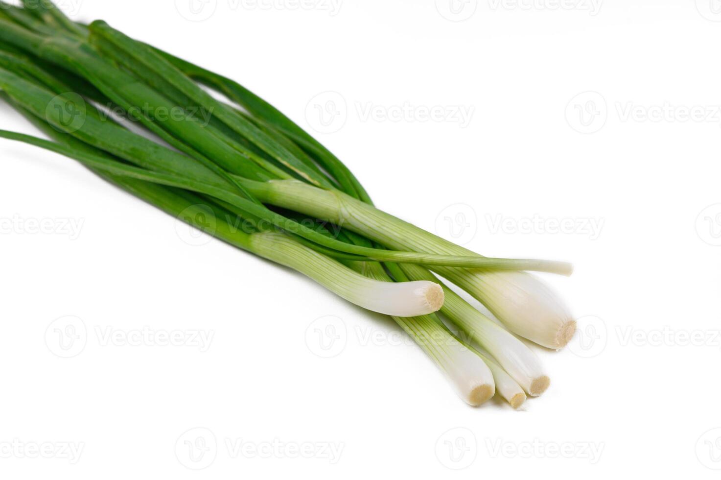 Fresh green onions ready for culinary adventures in a bright kitchen setting photo