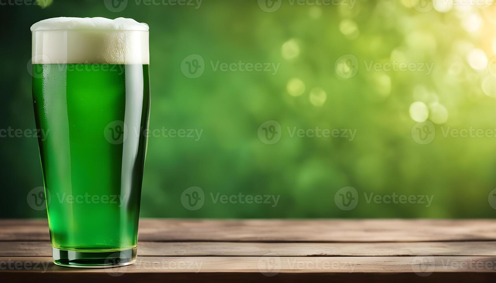 Traditional cold green beer on wooden table for Saint Patrick's Day. Copyspace photo