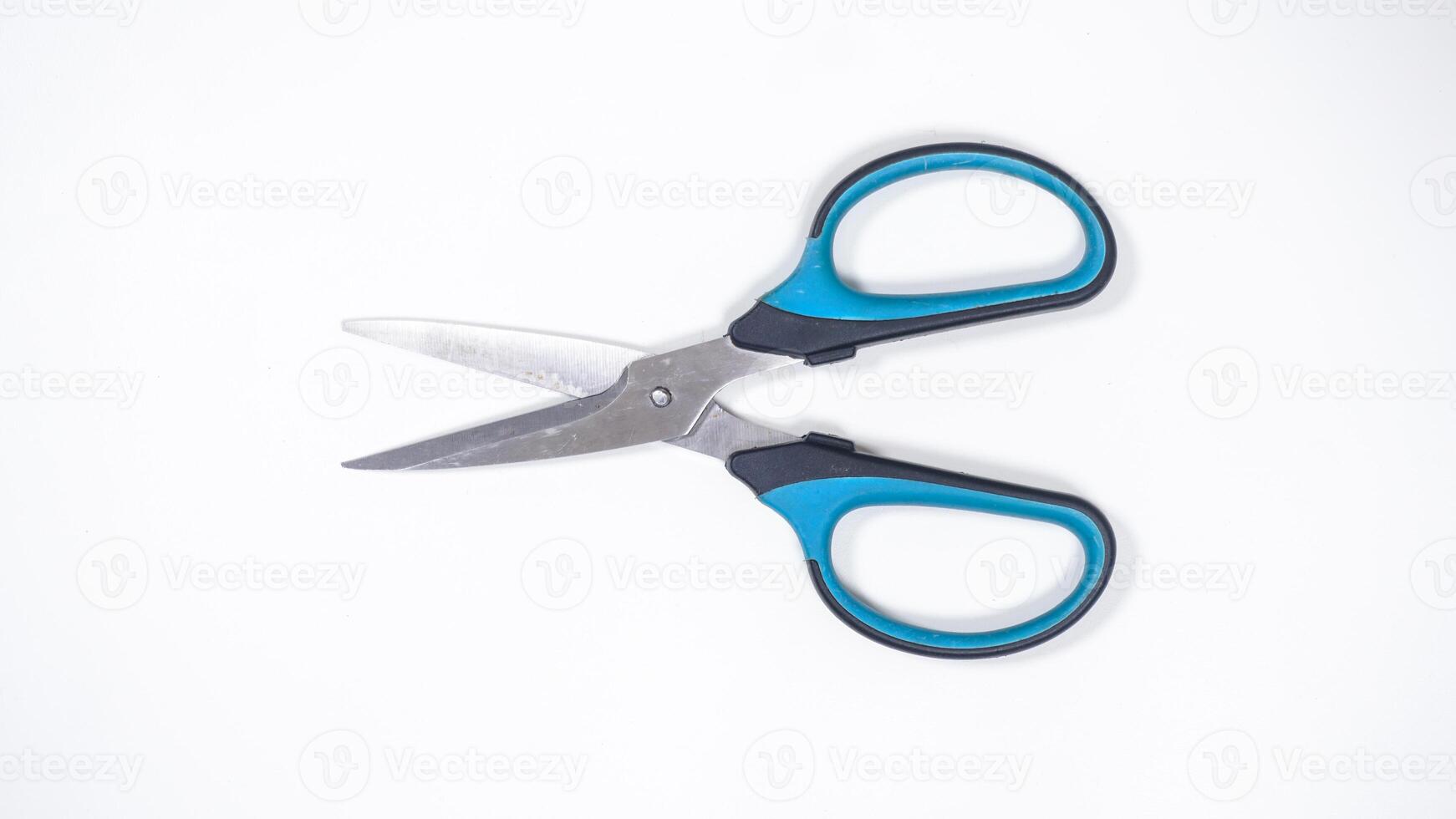 Top View of Open Scissor Isolated on White Background photo