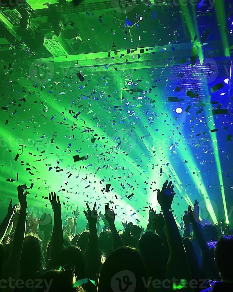 Euphoric Concert A Night of Celebration Under Green Laser Lights and Confetti photo