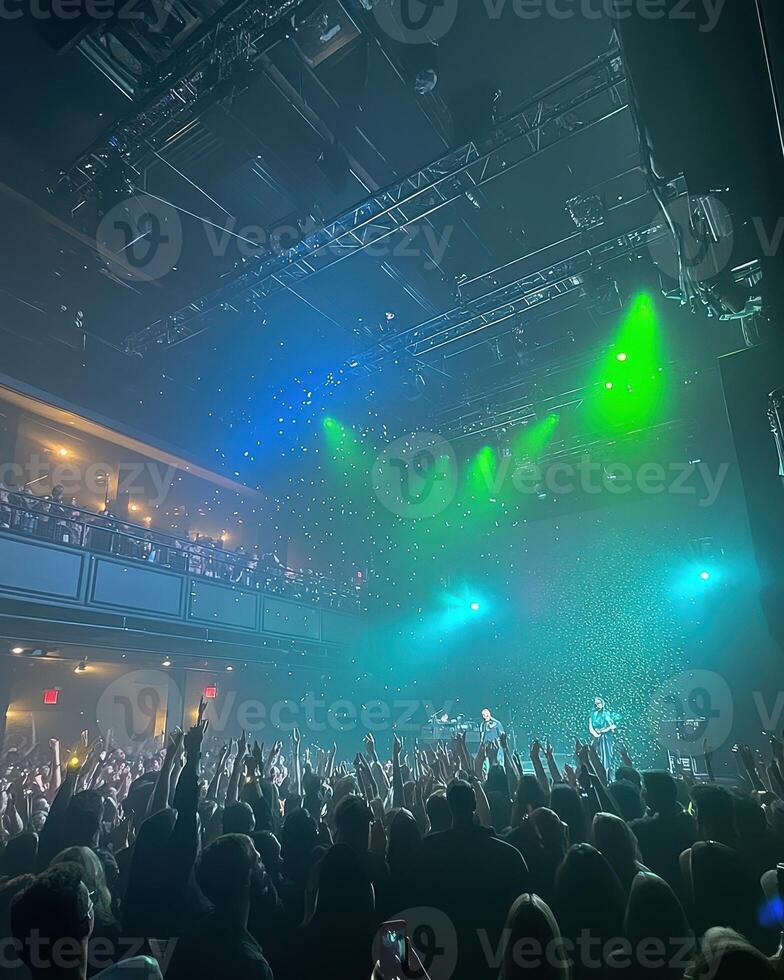 An Immersive Concert Experience Crowd Surging, Lights Dancing, Music Thrilling photo