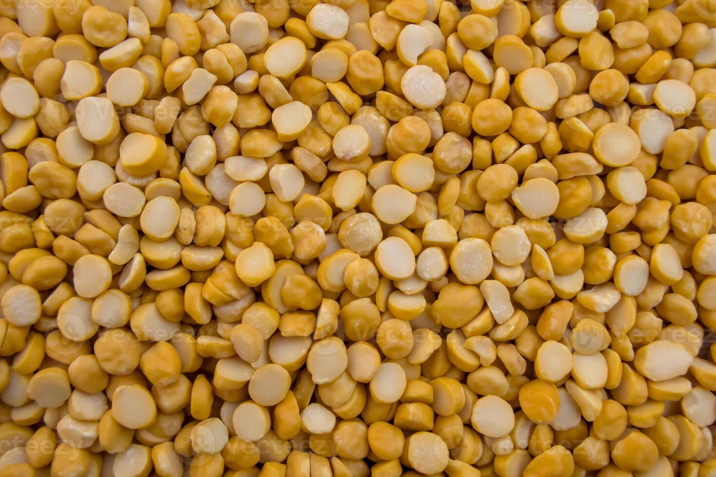 Full Frame View of Split Chickpeas Chana Dal Lentils photo