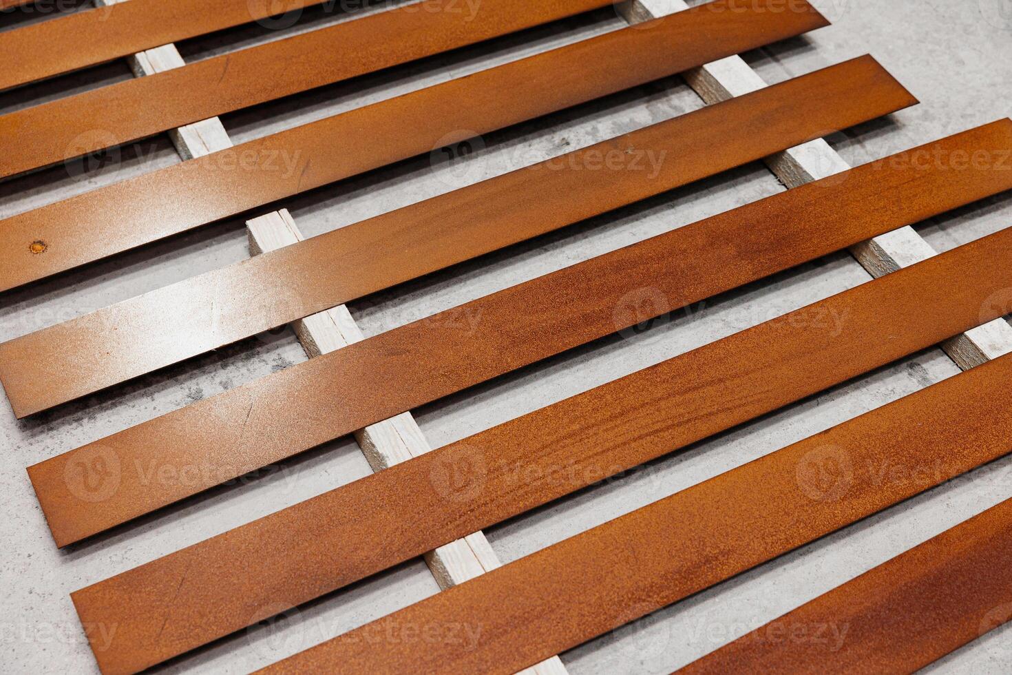 Whispers of Nature Sunlight Dancing Through Weathered Wooden Slats, Revealing Textured Patterns and Soft Shadows. photo