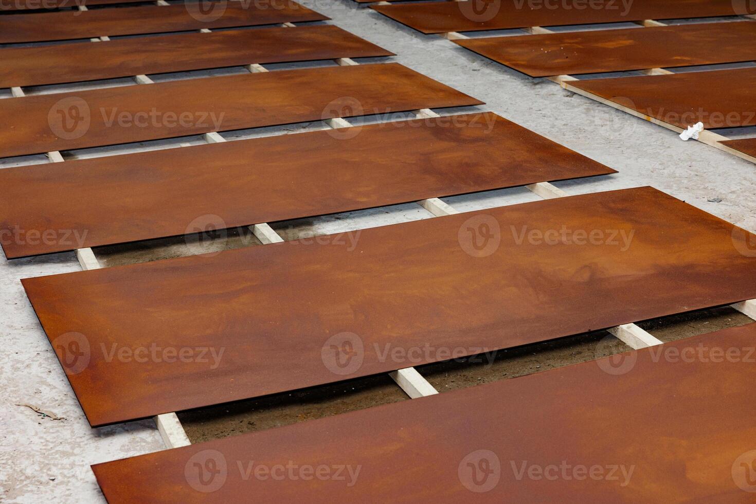 Rusty Elegance A Tapestry of Weathered Metal Sheets on Earths Canvas, Capturing Times Embrace with Unique Textur photo
