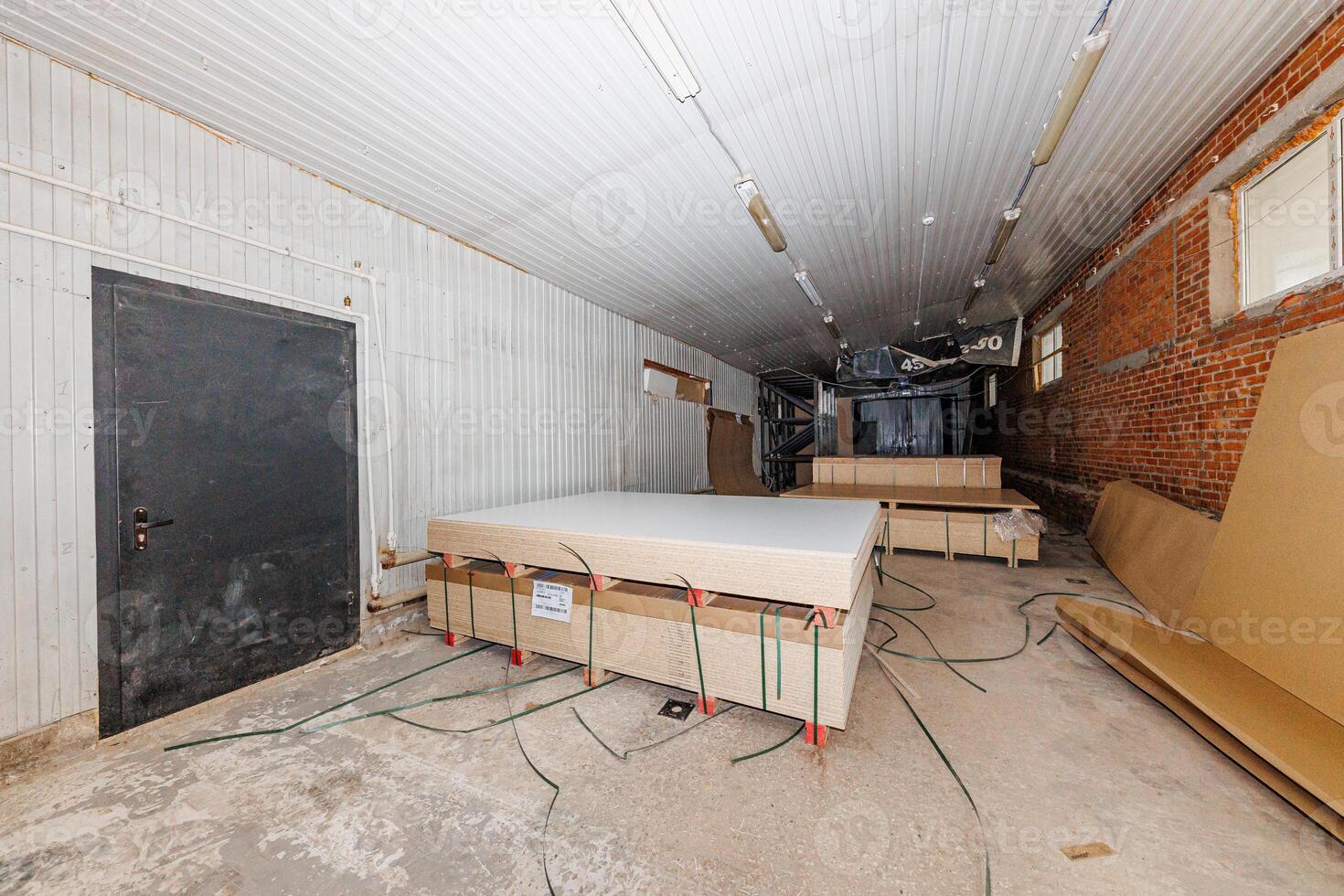 Urban Essence Amidst Stacked Boards and Brick Walls, Cables Whisper the Stories of Industrial Craftsmanship. photo