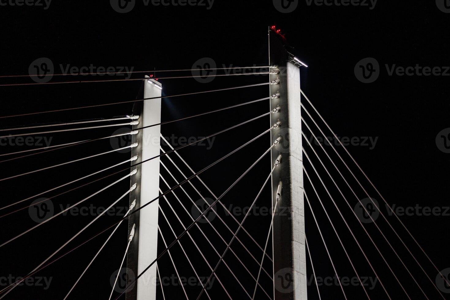 Radiant Reflections A Nighttime Symphony of Angled Cables and Illuminated Towers on a Majestic Cable-Stayed Bridge photo