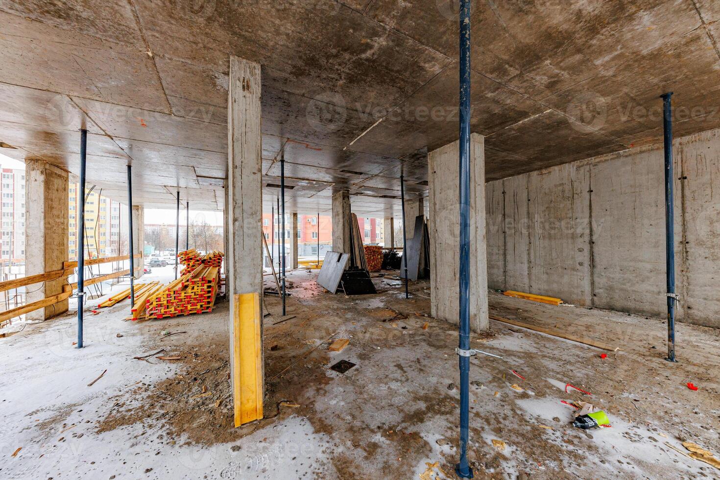 Emerging Horizons A construction site reveals a dance of concrete pillars and scattered tools, whispering tales of progress and the promise of new beginnings. photo