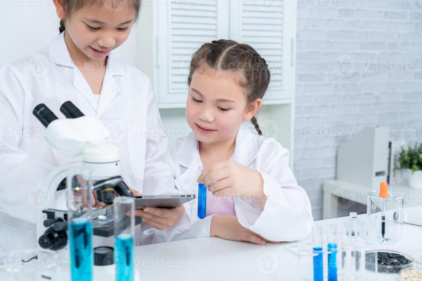 Scientist education scientific in laboratory. Medical child learning, Biotechnology, discover, imagine, executive function, kid, education, intelligence quotient, emotional quotient photo