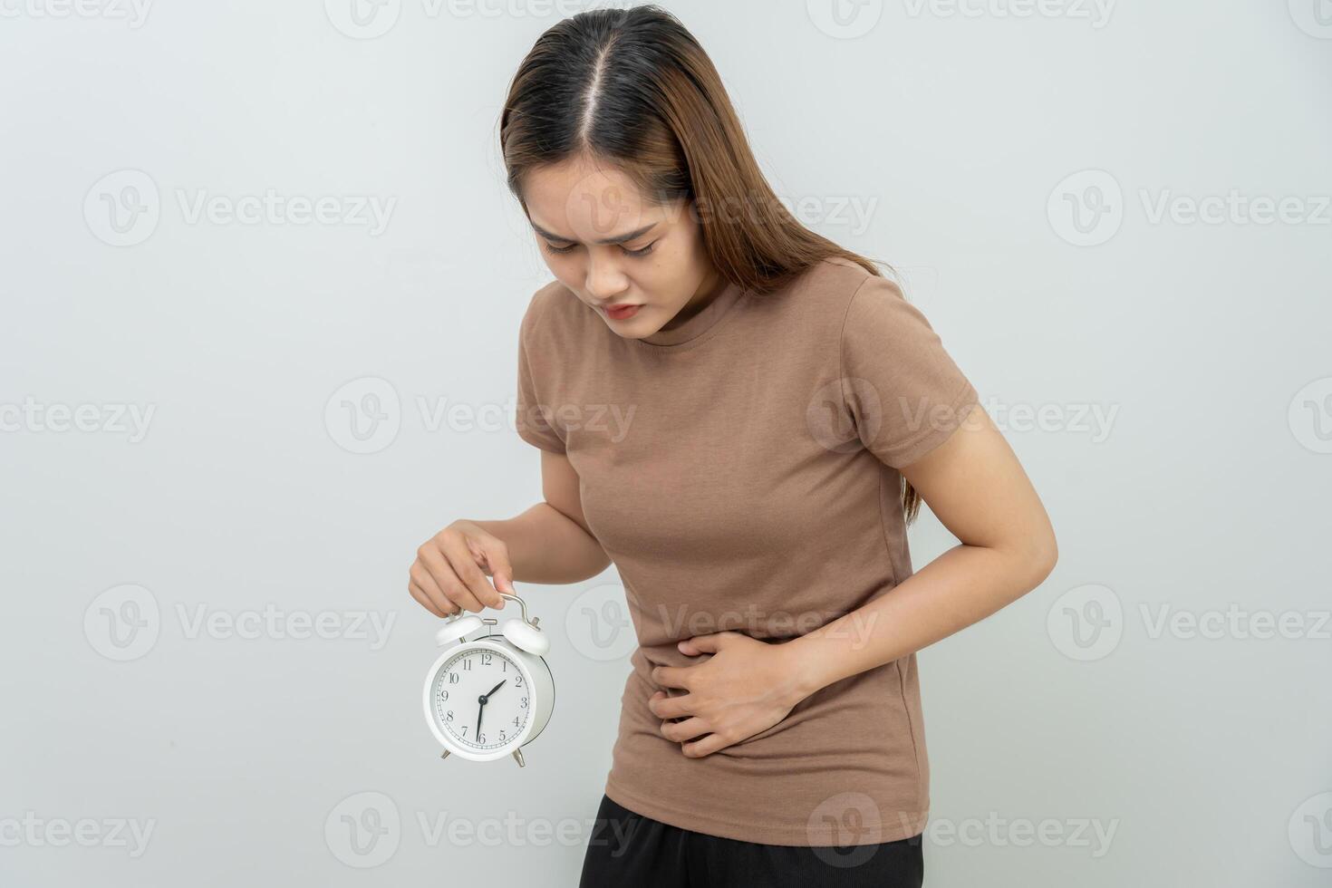 Stomach ache due to eating irregularly, menstrual cramps, flatulence, diarrhea, bloating, bloating, abdominal inflammation, food poisoning, constipation. photo