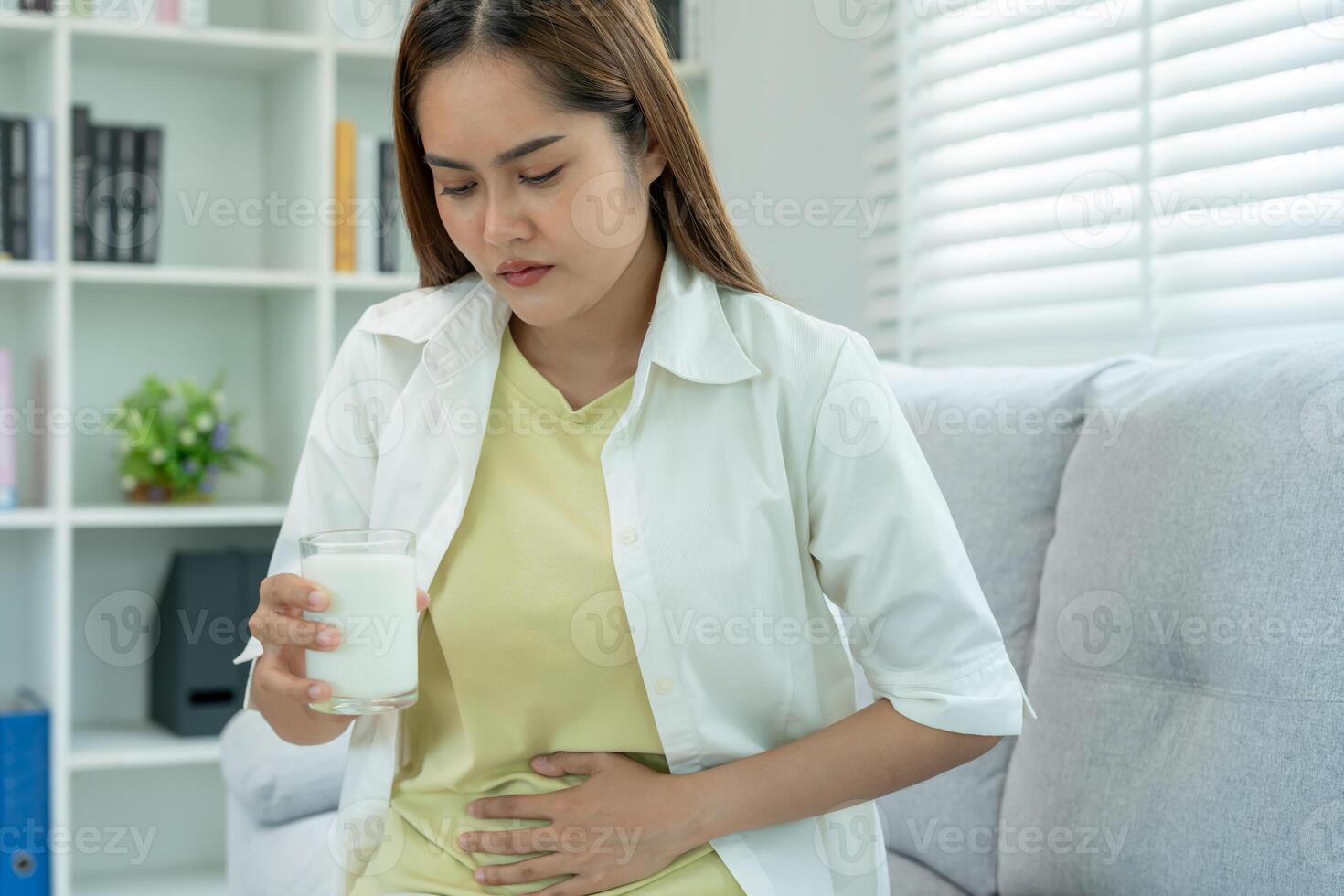 Sick sad unhealthy ill allergic woman, runny stuffy sore nose suffer from intolerance allergy trigger symptoms. abdominal pain, allergens, nut protein, rash, death, food allergy photo