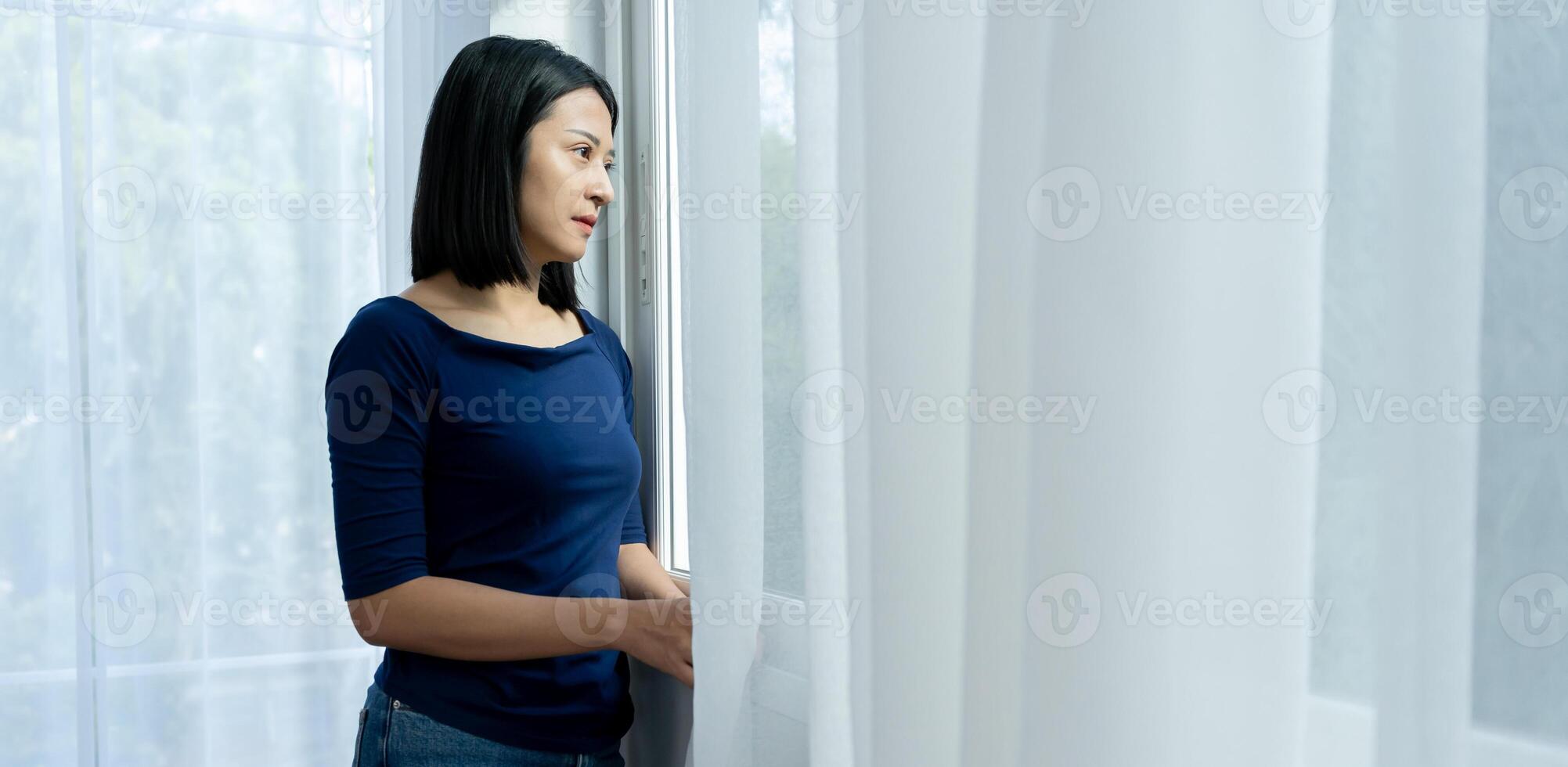 Unhappy asian woman girl disappointed, sad about problem in home alone, feel lonely, Stressed, suffering from bad relationship, break up, divorce, female confused photo