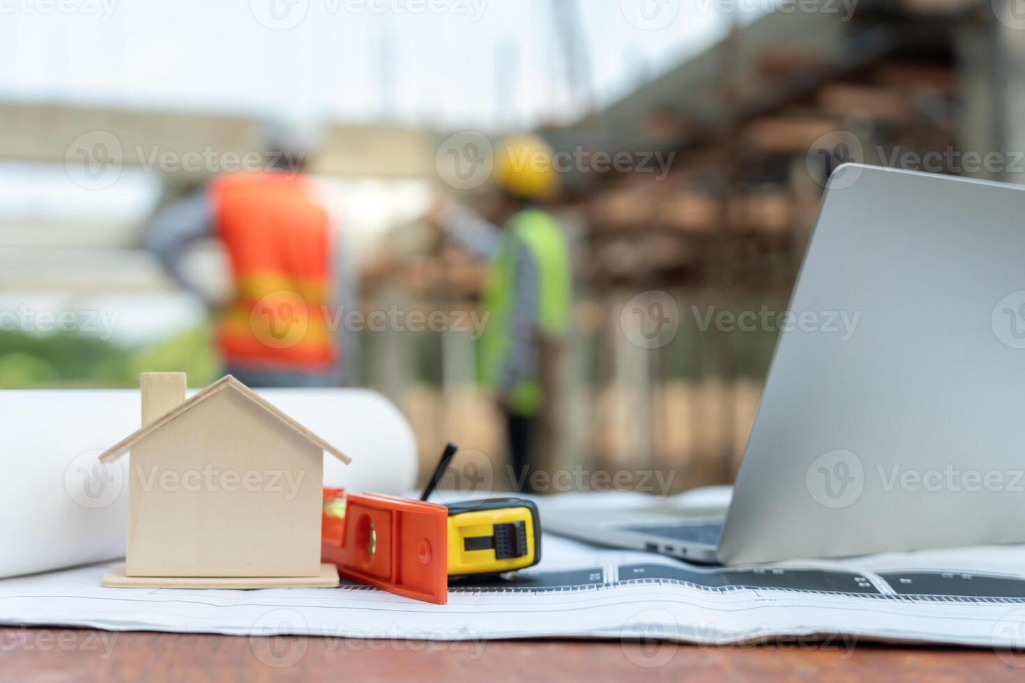 owner project is inspecting construction and quality assurance new house. Engineers or architects or contactor work to build the house before handing it over to the homeowner photo