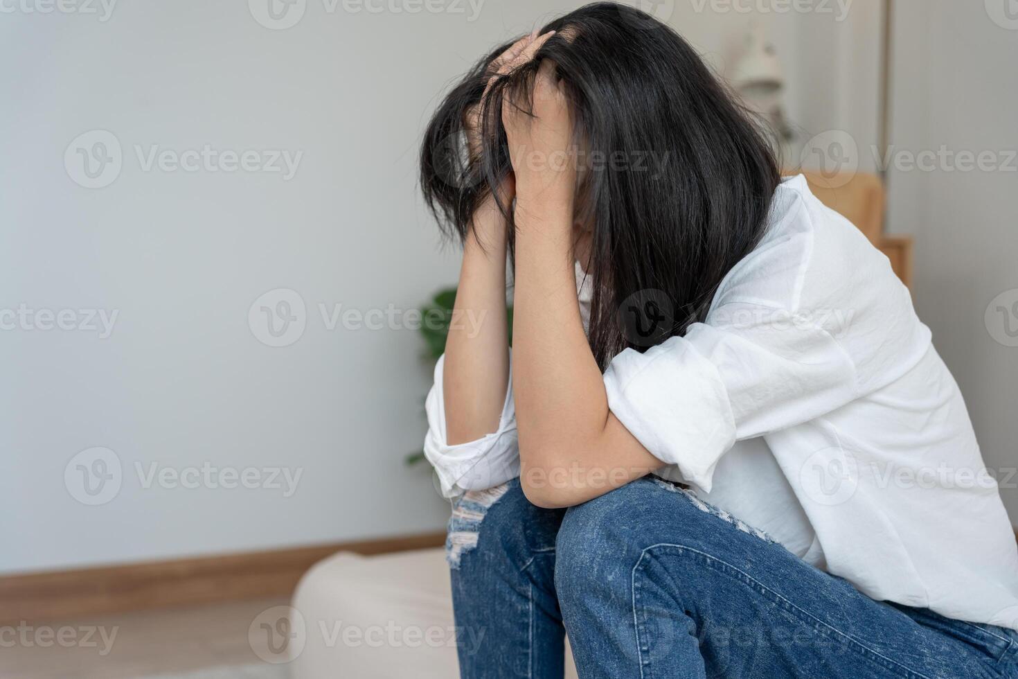 sad after receiving bad news. Stressed girl confused with unhappy problems, arguing with boyfriend, cry and worry about unexpected pregnancy. photo