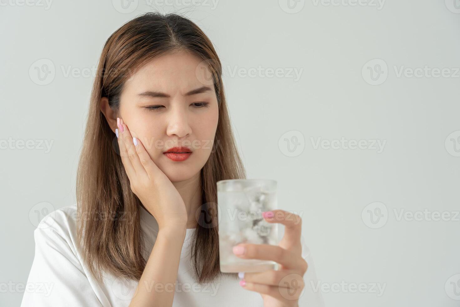 sensitive teeth after drinking cold, female suffer tooth, decay problems, dental care, tooth extraction, decay problem, bad breath, Gingival Recession, Oral Hygiene instruction photo