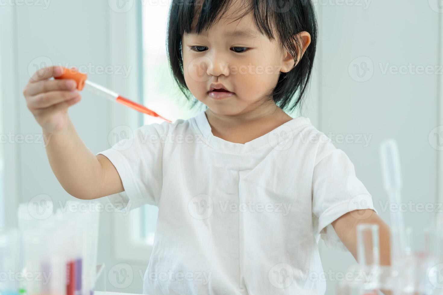 education scientific in laboratory. Medical child learning, Biotechnology, discover, imagine, executive function, kid, education, intelligence quotient, emotional quotient photo
