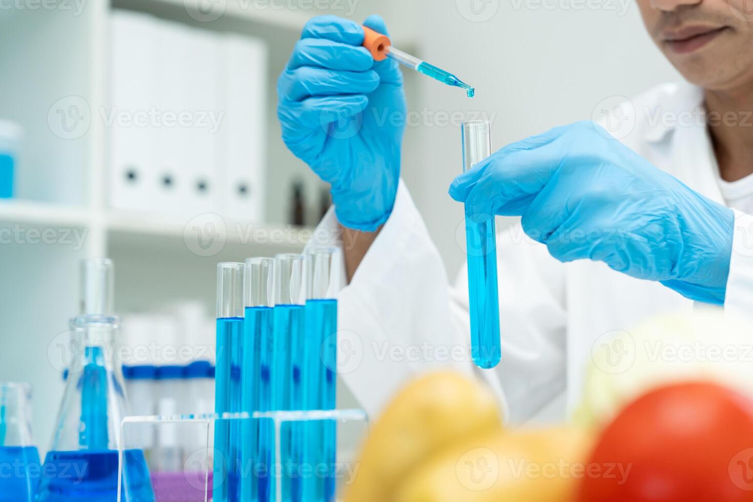 Scientist check chemical food residues in laboratory. Control experts inspect quality of fruits, vegetables. lab, hazards, ROHs, find prohibited substances, contaminate, Microscope. photo
