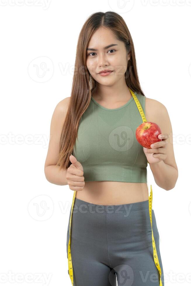 weight scale, results of diet. Beautiful shape. reduced waist size after under going a weight loss corse. balance, control, routines, exercise photo